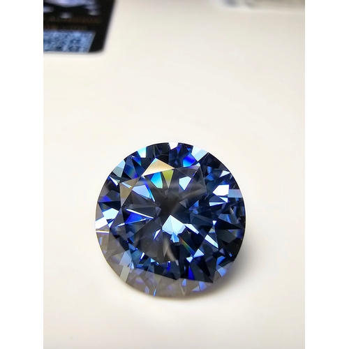 232 - A stunning rare and large 10ct Light Royal Blue Moissanite Diamond with a diameter of 14mm with full... 