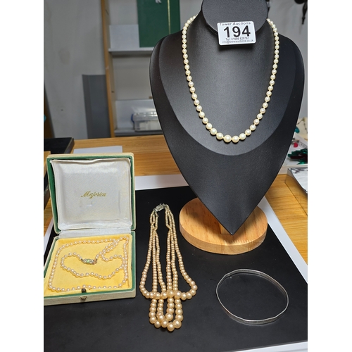 194 - Bundle of 3x vintage faux pearl necklaces and a 925 silver bangle, to include a cased set of majoric... 