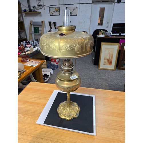 234 - A good quality antique French Parisien Brass Oil Lamp by Bec Gaulois, featuring an ornate red jewell... 