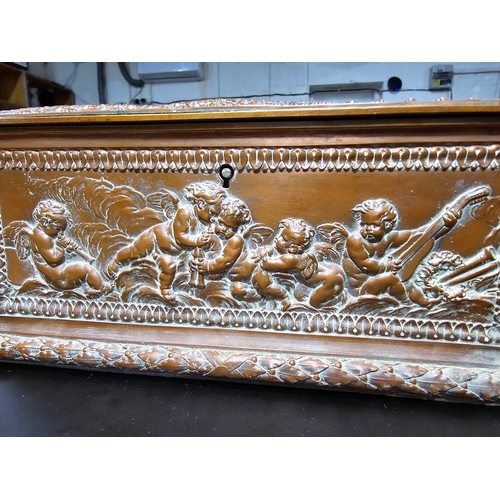 240 - Good quality ornate antique copper writing casket with an embossed design depicting classical scenes... 