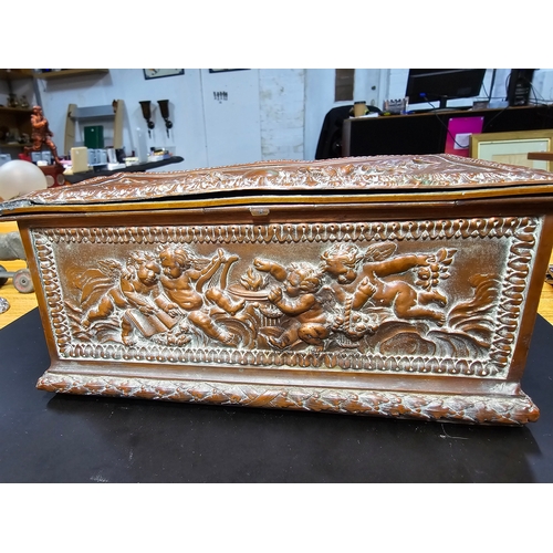 240 - Good quality ornate antique copper writing casket with an embossed design depicting classical scenes... 