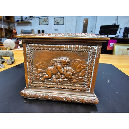 240 - Good quality ornate antique copper writing casket with an embossed design depicting classical scenes... 