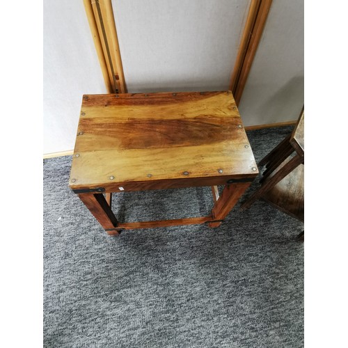 425 - A small sheesham metal bound side table along with a smaller vintage oak side table with shelf on th... 