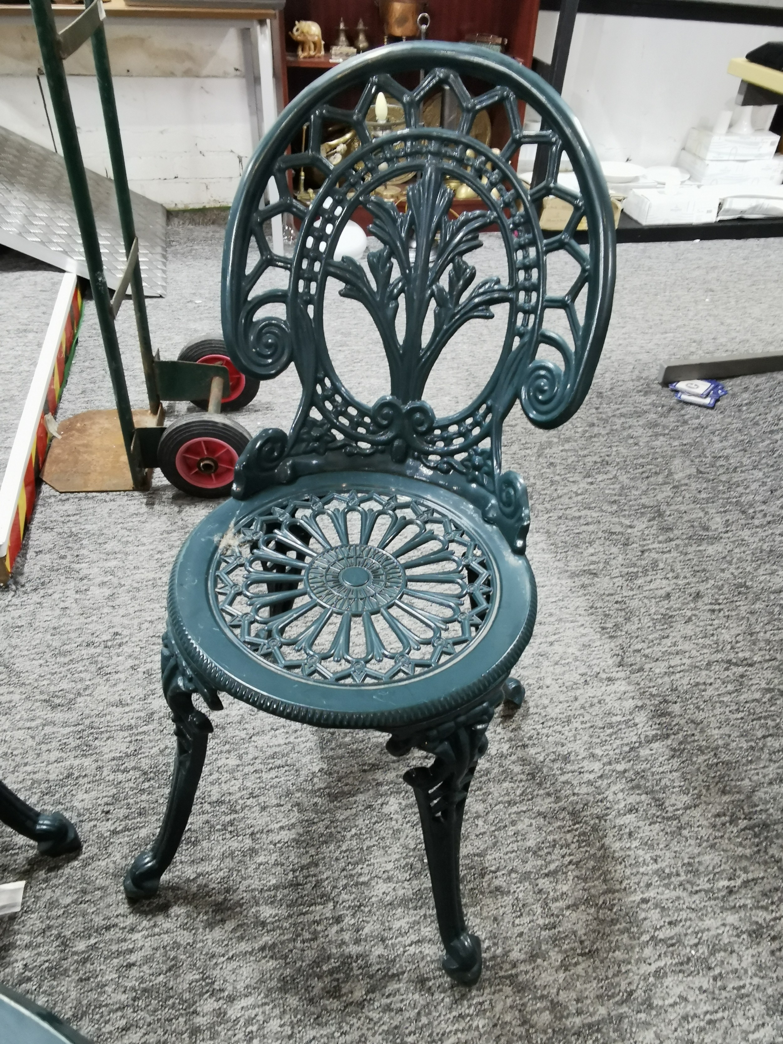 A good quality cast iron garden table and 2 chairs in excellent ...