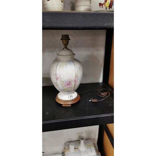 347 - Pretty floral porcelain table lamp with wooden base in very good clean condition. Height 41cm.