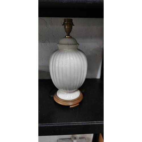 347 - Pretty floral porcelain table lamp with wooden base in very good clean condition. Height 41cm.