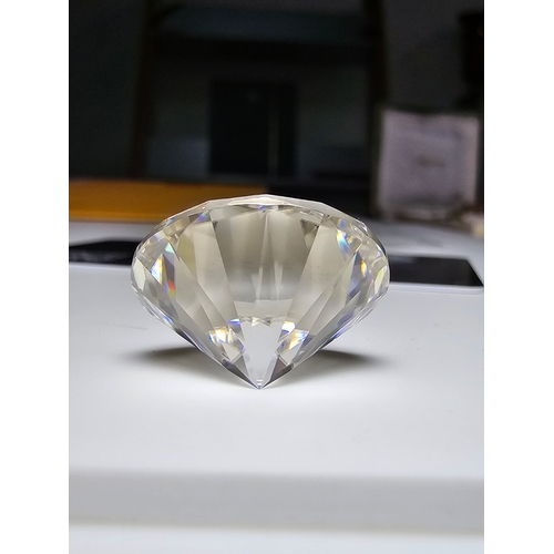 312 - A stunning very rare and large 30ct Belgian Cut Clear Moissanite Diamond with a diameter of 20mm wit... 