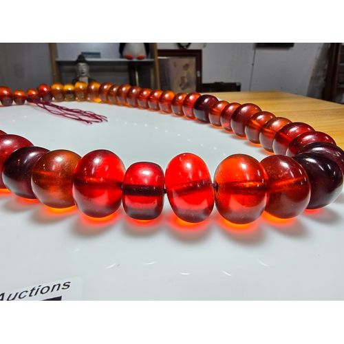 187 - Good Vintage Very Large and Impressive Bakelite Amber Beaded Necklace, which are heavy having a tota... 