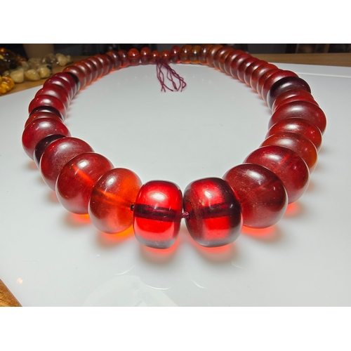 187 - Good Vintage Very Large and Impressive Bakelite Amber Beaded Necklace, which are heavy having a tota... 