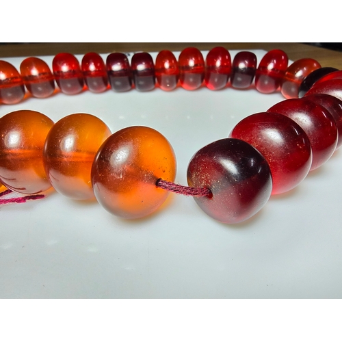 187 - Good Vintage Very Large and Impressive Bakelite Amber Beaded Necklace, which are heavy having a tota... 