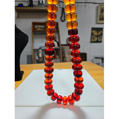 187 - Good Vintage Very Large and Impressive Bakelite Amber Beaded Necklace, which are heavy having a tota... 