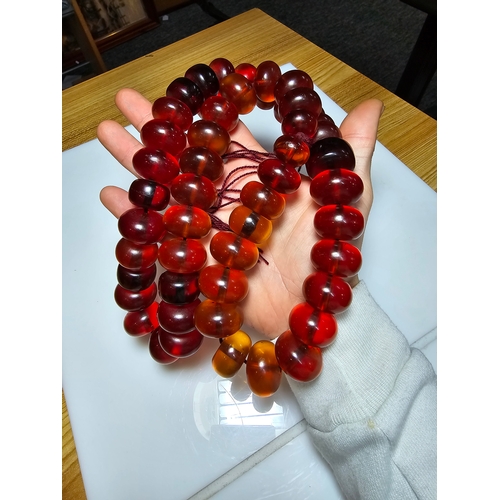 187 - Good Vintage Very Large and Impressive Bakelite Amber Beaded Necklace, which are heavy having a tota... 