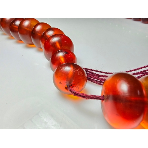 187 - Good Vintage Very Large and Impressive Bakelite Amber Beaded Necklace, which are heavy having a tota... 