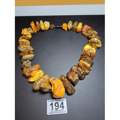 194 - A good vintage genuine amber large beaded necklace featuring loosely polished & shaped natural amber... 