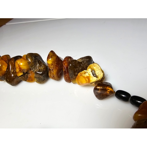 194 - A good vintage genuine amber large beaded necklace featuring loosely polished & shaped natural amber... 