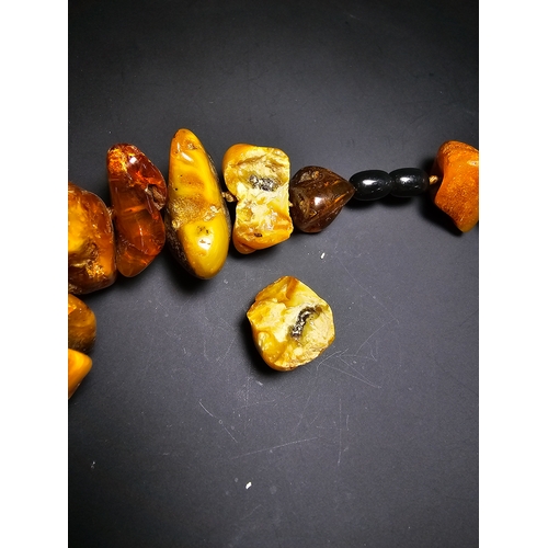 194 - A good vintage genuine amber large beaded necklace featuring loosely polished & shaped natural amber... 