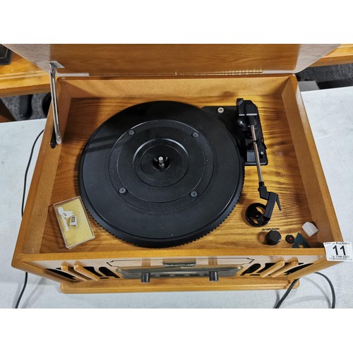 11 - A Classic reproduction record player hifi system, complete with CD, cassette and turntable. Appears ... 