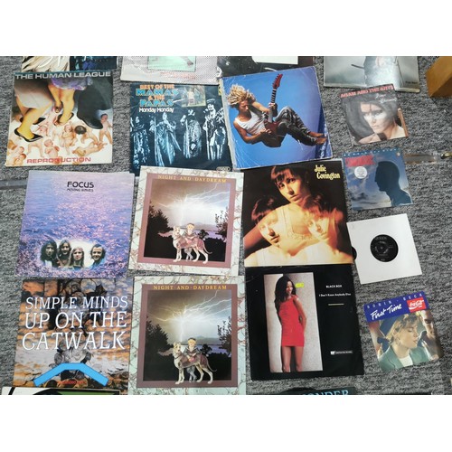 13 - A large quantity of LP vinyl records to include artists such as Status Quo, Beach boys, Steve Wonder... 