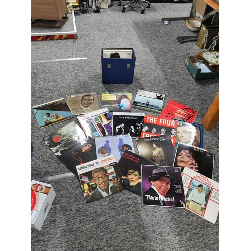 13 - A large quantity of LP vinyl records to include artists such as Status Quo, Beach boys, Steve Wonder... 