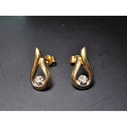 302 - Pair of 9ct yellow gold stud earrings both inset with a real diamond, in good clean condition comple... 