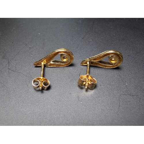 302 - Pair of 9ct yellow gold stud earrings both inset with a real diamond, in good clean condition comple... 