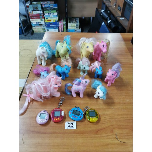 23 - A quantity of vintage 1980's My little Pony items along with a Tamagotchi Angel from 1997 along with... 