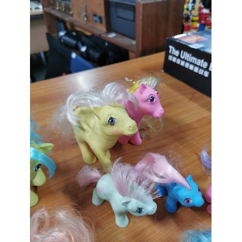 23 - A quantity of vintage 1980's My little Pony items along with a Tamagotchi Angel from 1997 along with... 