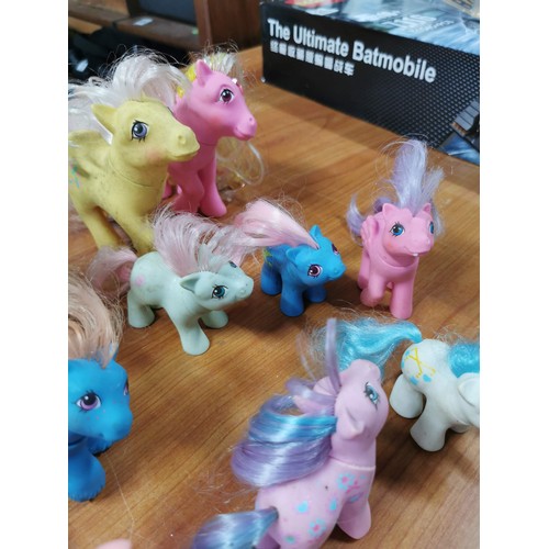 23 - A quantity of vintage 1980's My little Pony items along with a Tamagotchi Angel from 1997 along with... 