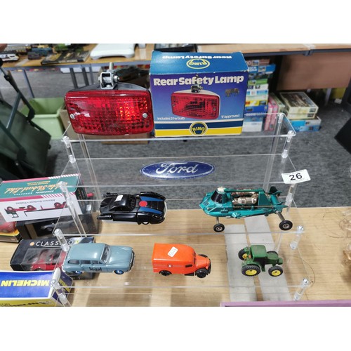 26 - A quantity of collectable diecast model vehicles to include an Renault Eligor, a vintage new and sea... 