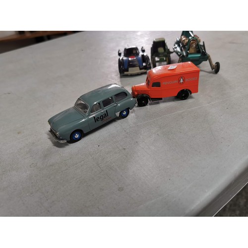 26 - A quantity of collectable diecast model vehicles to include an Renault Eligor, a vintage new and sea... 