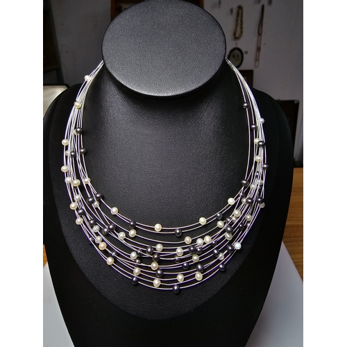 295 - Stunning hallmarked 18ct white gold multi strand pearl necklace by Isle Of Wight Pearl (Millennium R... 