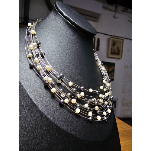 295 - Stunning hallmarked 18ct white gold multi strand pearl necklace by Isle Of Wight Pearl (Millennium R... 