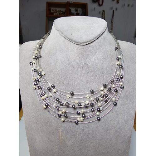 295 - Stunning hallmarked 18ct white gold multi strand pearl necklace by Isle Of Wight Pearl (Millennium R... 