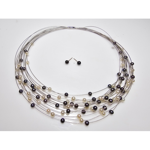 295 - Stunning hallmarked 18ct white gold multi strand pearl necklace by Isle Of Wight Pearl (Millennium R... 