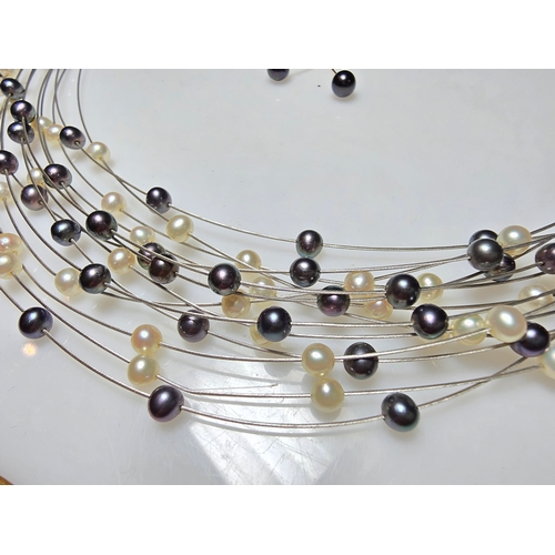 295 - Stunning hallmarked 18ct white gold multi strand pearl necklace by Isle Of Wight Pearl (Millennium R... 