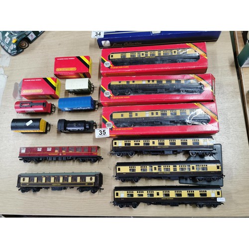 35 - A quantity of Hornby 00 gauge coaches and rolling stock along with a Smokey Joe Hornby loco, 3 of th... 