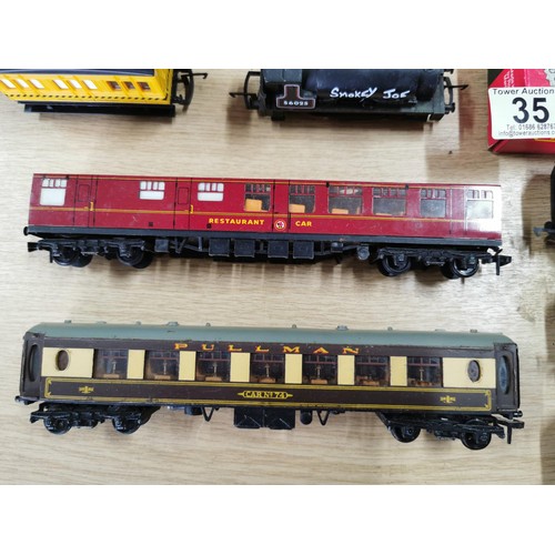 35 - A quantity of Hornby 00 gauge coaches and rolling stock along with a Smokey Joe Hornby loco, 3 of th... 