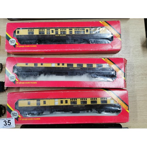 35 - A quantity of Hornby 00 gauge coaches and rolling stock along with a Smokey Joe Hornby loco, 3 of th... 