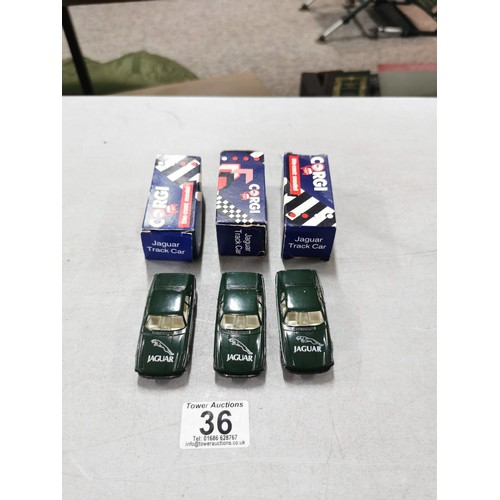 36 - 3x boxed Corgi diecast model Jaguar track cars (all identical).