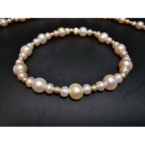 296 - Good quality matching Genuine Pearl necklace and expandable bracelet featuring 10k gold beads to the... 