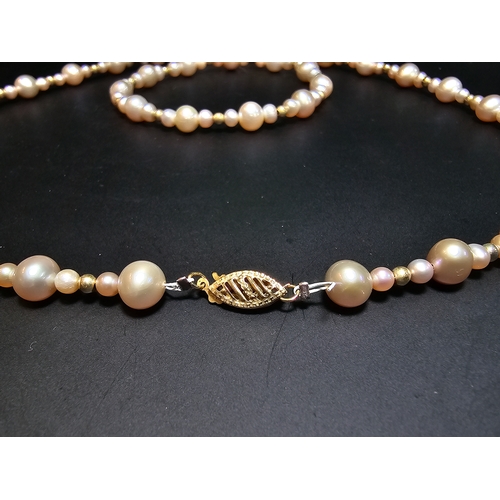 296 - Good quality matching Genuine Pearl necklace and expandable bracelet featuring 10k gold beads to the... 