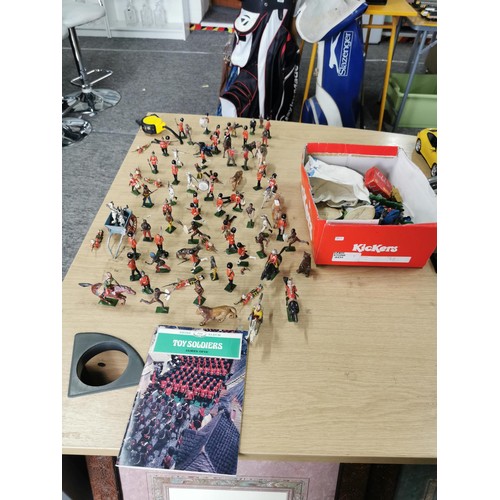 39 - A large quantity of good quality early vintage Britains lead solider and animal figures along with a... 