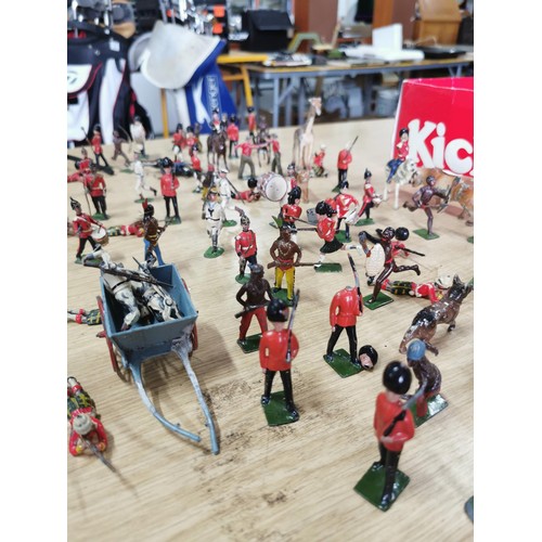 39 - A large quantity of good quality early vintage Britains lead solider and animal figures along with a... 