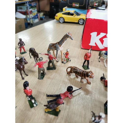 39 - A large quantity of good quality early vintage Britains lead solider and animal figures along with a... 