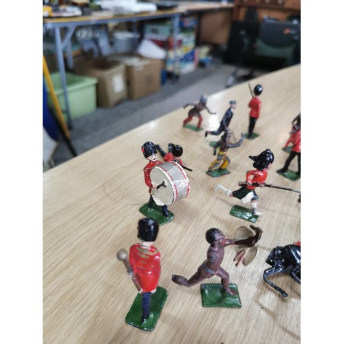 39 - A large quantity of good quality early vintage Britains lead solider and animal figures along with a... 