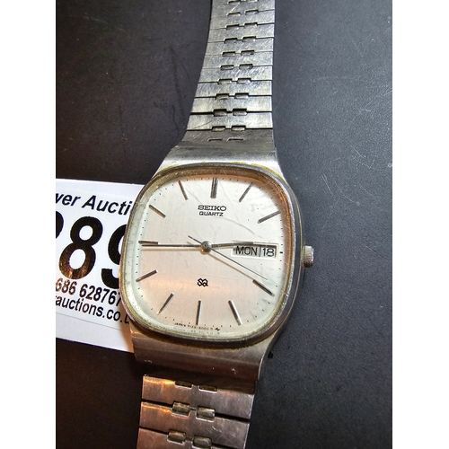 289 - A good vintage Seiko SQ quartz watch with its original seiko chrome strap, will require a new batter... 