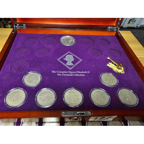 177 - A part complete collection of the Queen Elizabeth II Pre-Decimal Coin Collection. All fitted in a ni... 