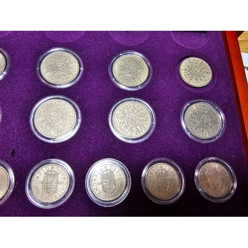 177 - A part complete collection of the Queen Elizabeth II Pre-Decimal Coin Collection. All fitted in a ni... 