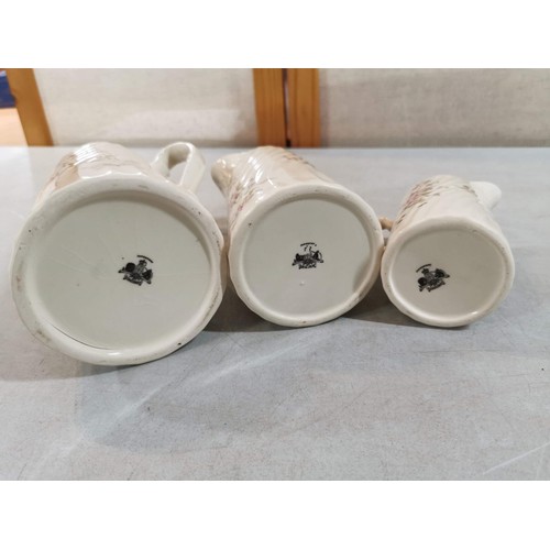 61 - Set of 3 x graduated floral jugs all in good order all stamped to the base Caolard Ironstone. Talles... 