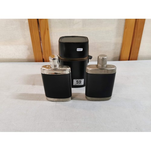 59 - Cased set of 2 x hip flasks, in original case, one hip flask has original stopper, both in good orde... 